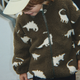 Konges Slojd detská fleecová bunda Joddy Teddy GRS Dino silueta